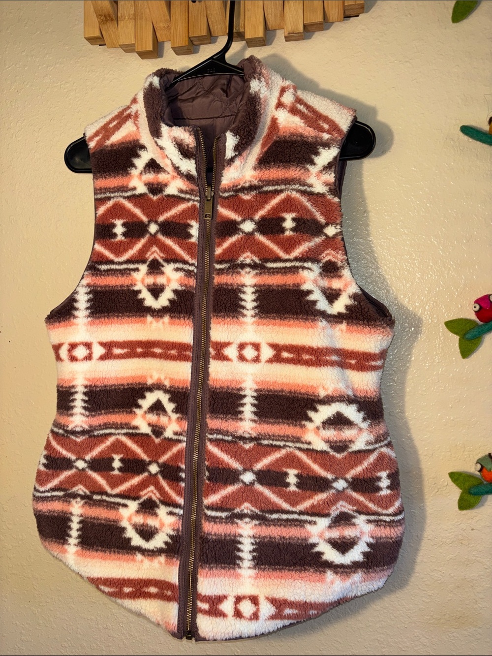 NWOT Maurices women's reversible sherpa vest with a multicolor Aztec print o